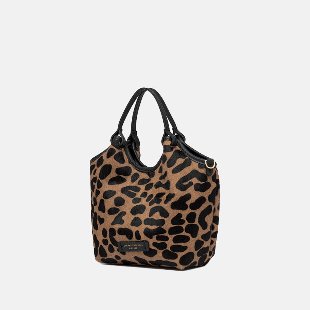 Leopard print handbag with black handles on a light gray background