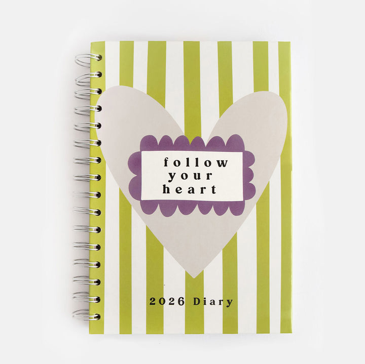 2026 wire bound diary with hardcover featuring green stripes and large grey heart with the words follow your heart