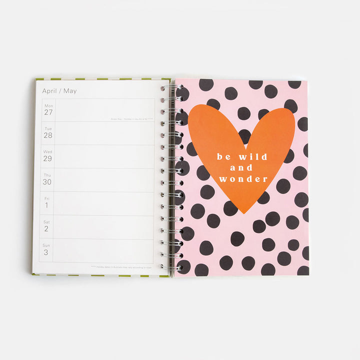 2026 wire bound diary internal with week to view and pink & black spot page with red heart and words be wild and wonder