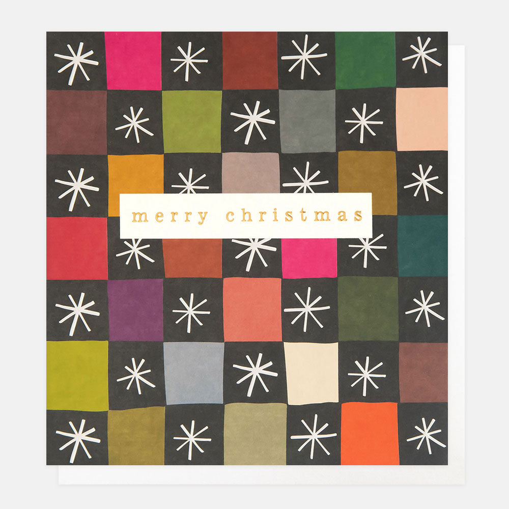 Christmas card featuring a colourful check design with white stars and the message 'merry Christmas' in a white box