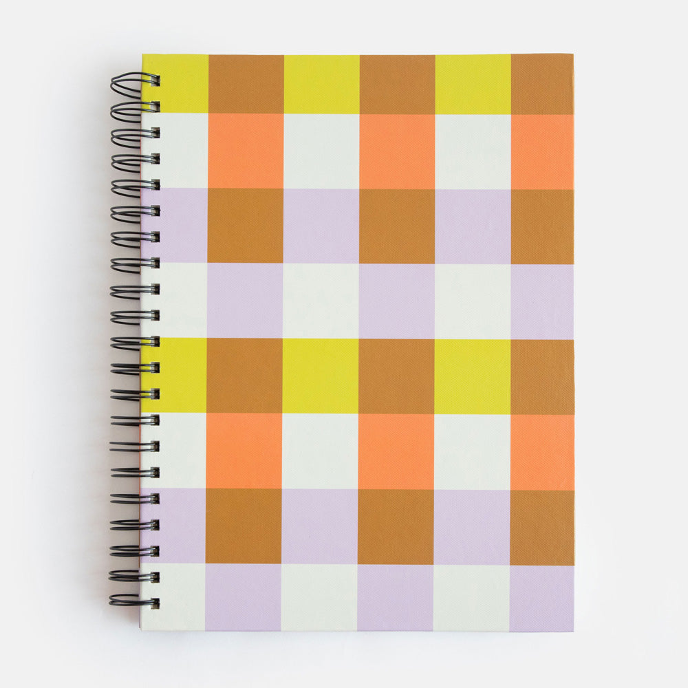 a4 spiral bound hardcover notebook with a warm tones checked print cover