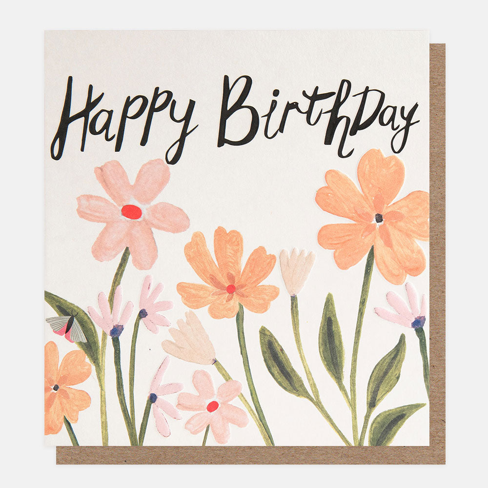 birthday card featuring a butterfly amidst peach coloured flowers and 'happy birthday' message in black handwritten style lettering