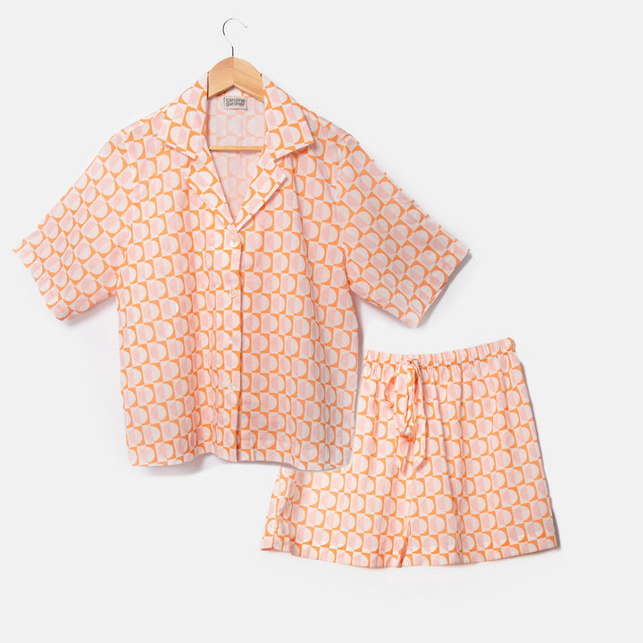 pastel pink & orange geometric circles print cotton pyjama set with shorts and revere collar short sleeved shirt