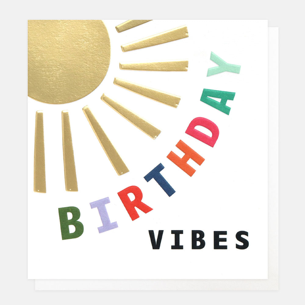 gold sunshine card on white background with multi-coloured birthday vibes slogan