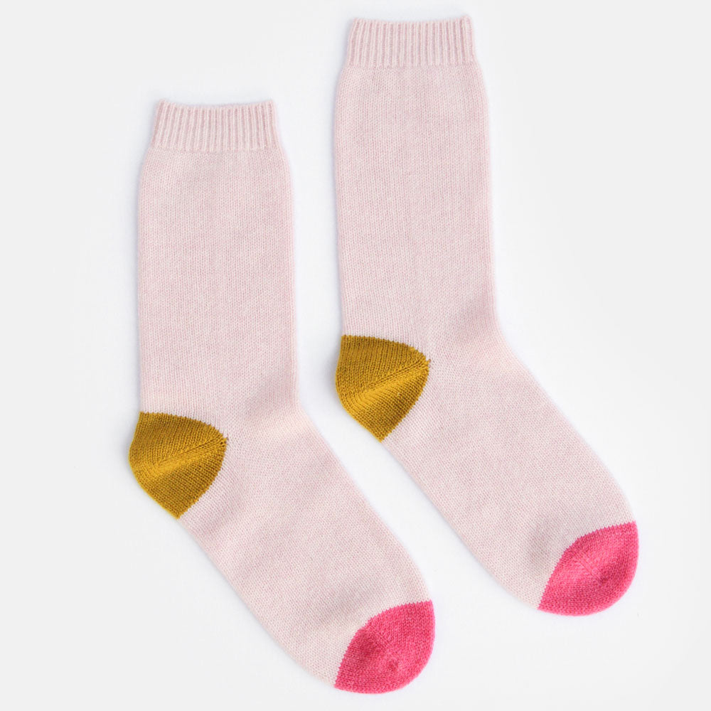 pale pink, mustard and bright pink cashmere bed socks