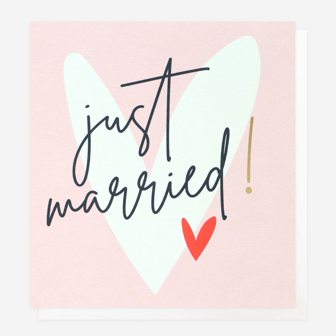 just married wedding card with white heart on pink background