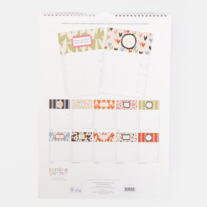 A spiral-bound planner pad set by Caroline Gardner displayed flat against a white background. The back cover showcases sample pages with colorful patterns and a grid of various cover designs.