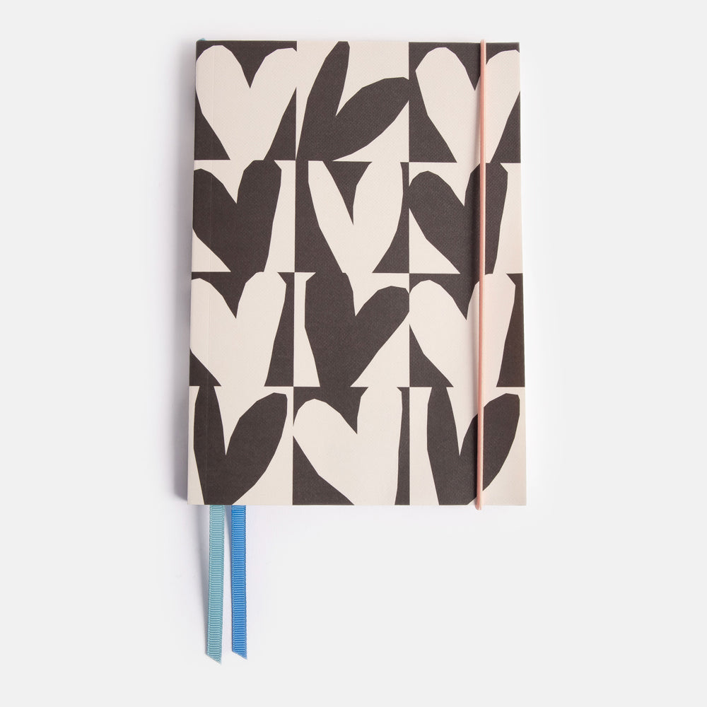 soft cover a5 lined notebook with monochrome checked hearts print design