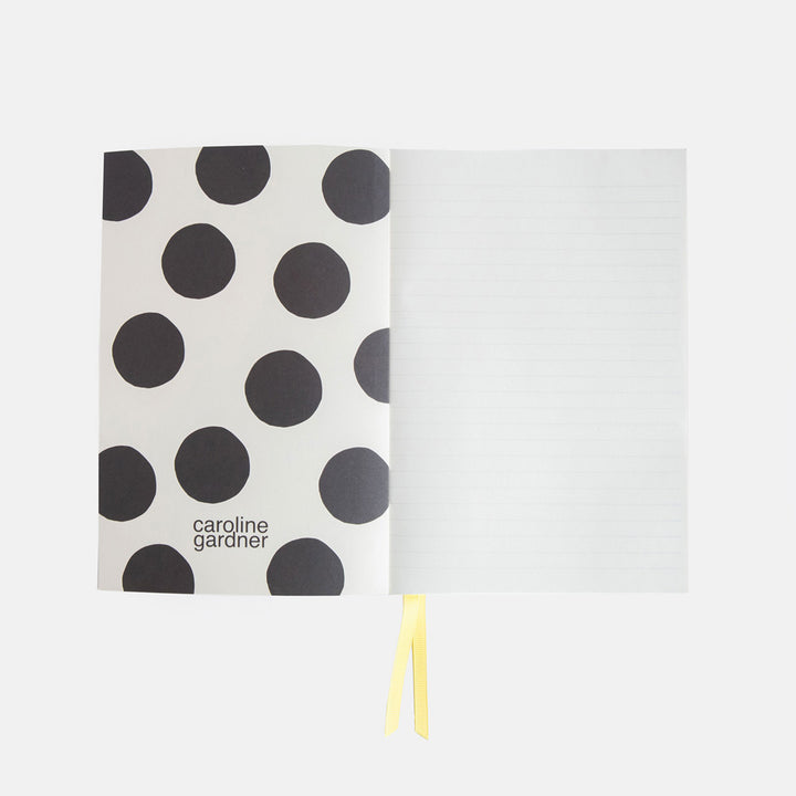 A5 softback notebook with a big spot inner print and lined pages