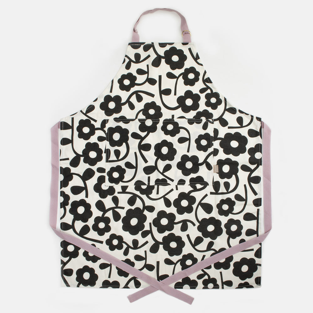 black and white monochrome floral print apron with pink straps