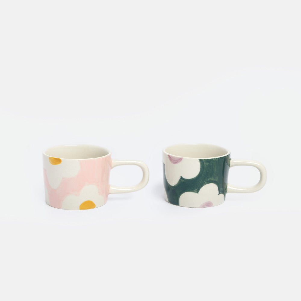 set of 2 espresso cups, one in a pink flora design the other in a green floral desing