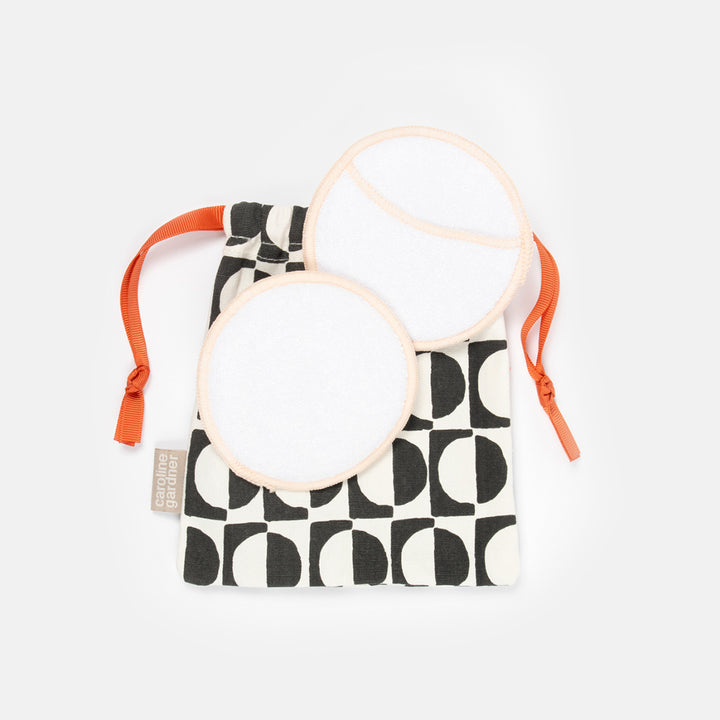 eco bamboo cleansing pads in monochrome black and white geometric design drawstring bag