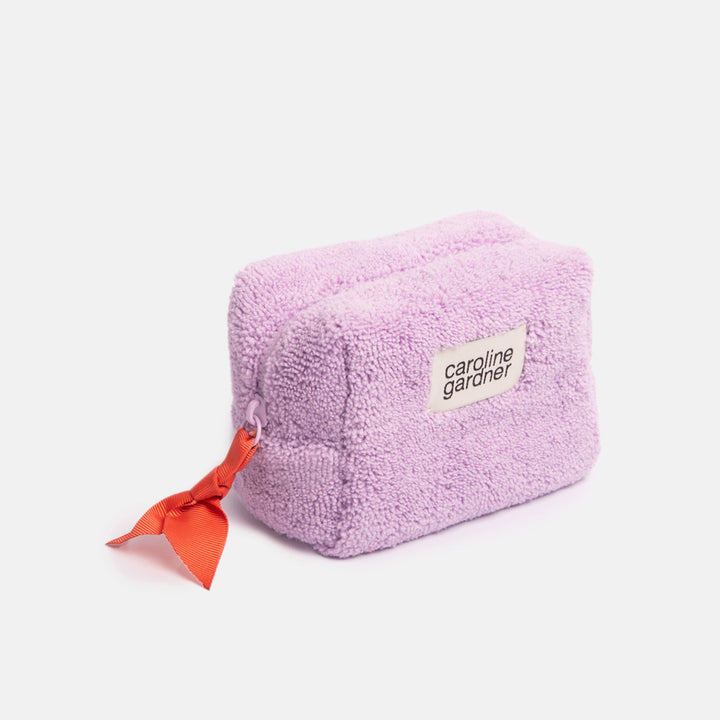 lilac borg mini cube cosmetics bag with orange grosgrain zip pull and caroline gardner branded tab