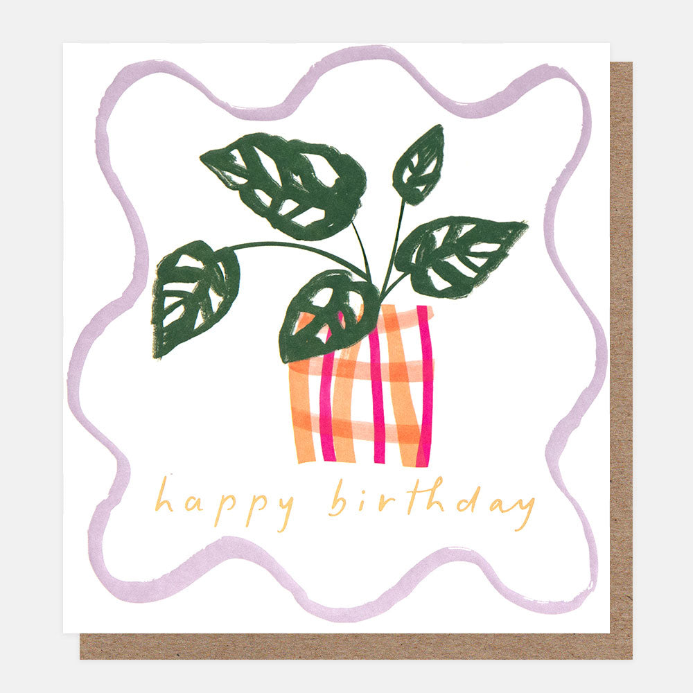 birthday card featuring a potted monstera plant and 'happy birthday' message in a wavy lilac border
