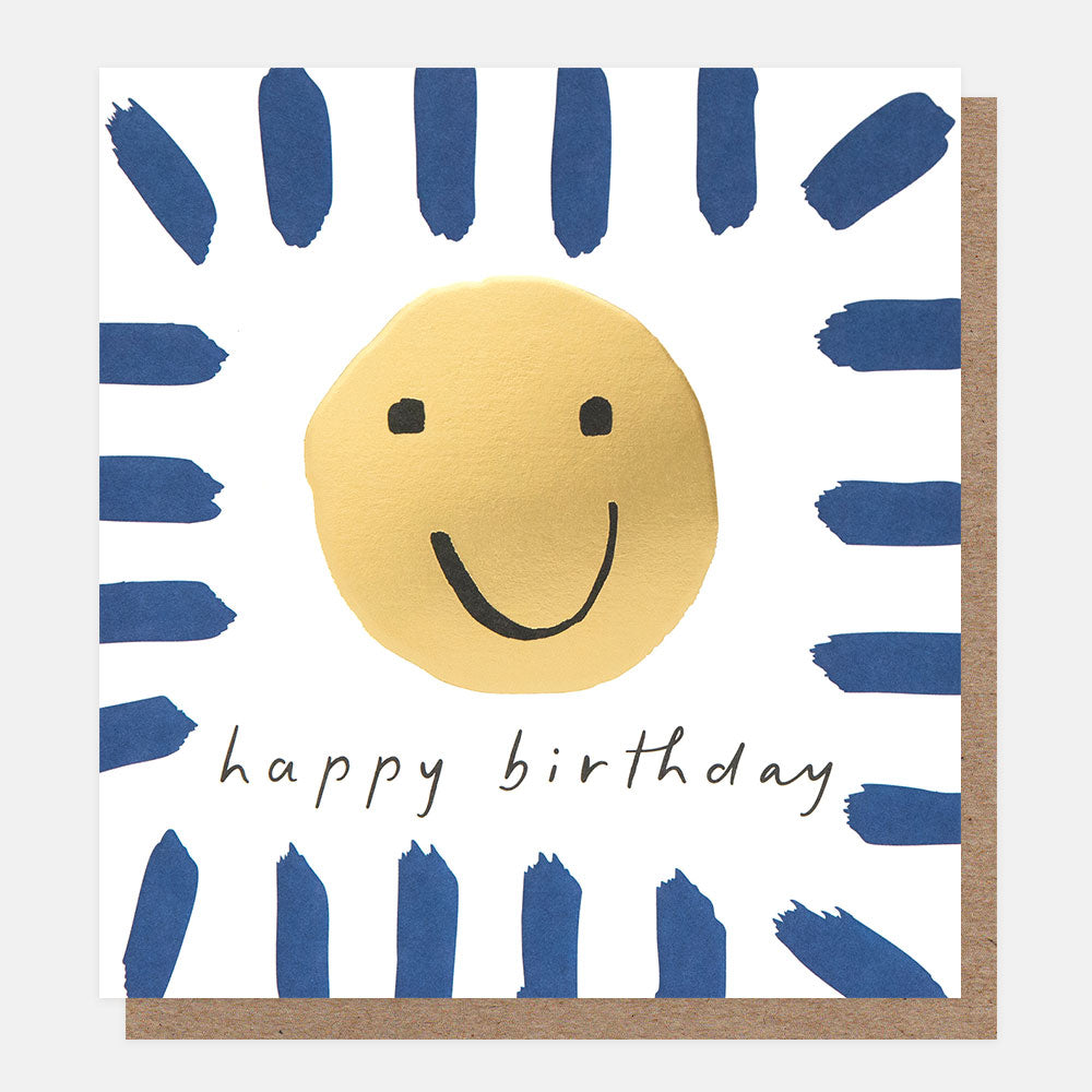 birthday card featuring a gold smiley face and 'happy birthday' message in a blue brushstrokes border
