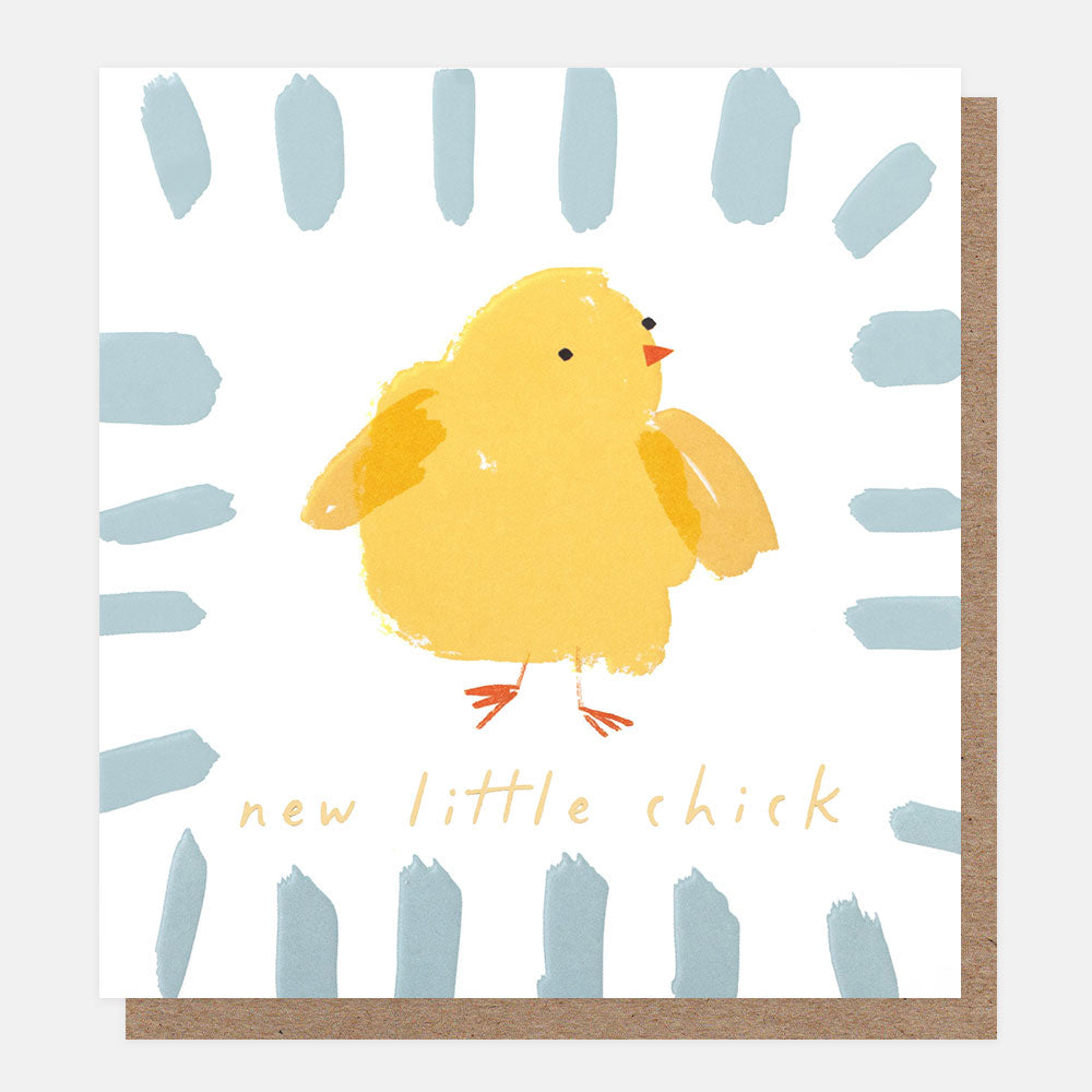 A square greeting card featuring a yellow chick illustration in the center, surrounded by light blue brushstroke rays and the words 'new little chick' in gold script. The card is shown with a brown kraft envelope behind it on a white background.