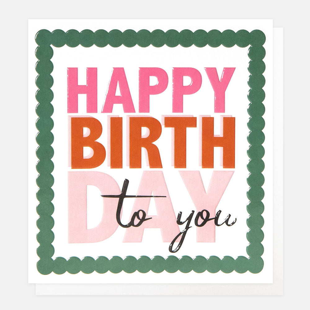 greetings card featuring bld pink text 'happy birthday to you' inside a green bobbled border on a white background