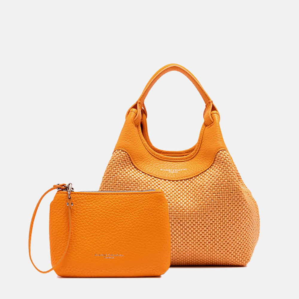 bright orange woven straw dua tote bag with small leather clutch bag