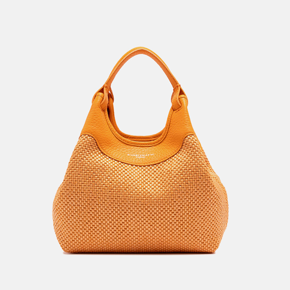 bright orange woven straw dua tote bag with small leather clutch bag