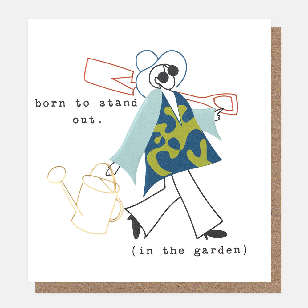 A square white greeting card with a whimsical illustrated gardener wearing a blue and green patterned shirt, white pants, and a white hat, holding a gold watering can and a red/orange shovel. The card reads 'born to stand out (in the garden)'.