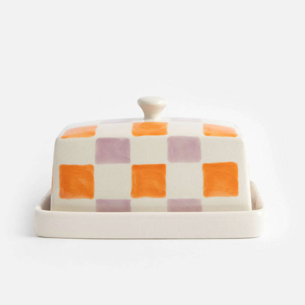 ceramic stoneware butter dish with handle in orange and lilac grid check design