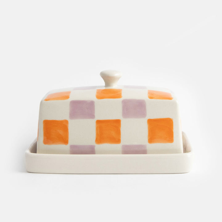 ceramic stoneware butter dish with handle in orange and lilac grid check design