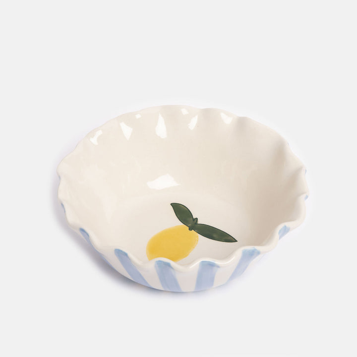 blue scalloped edge glazed stoneware cereal bowl with yellow lemon design inside