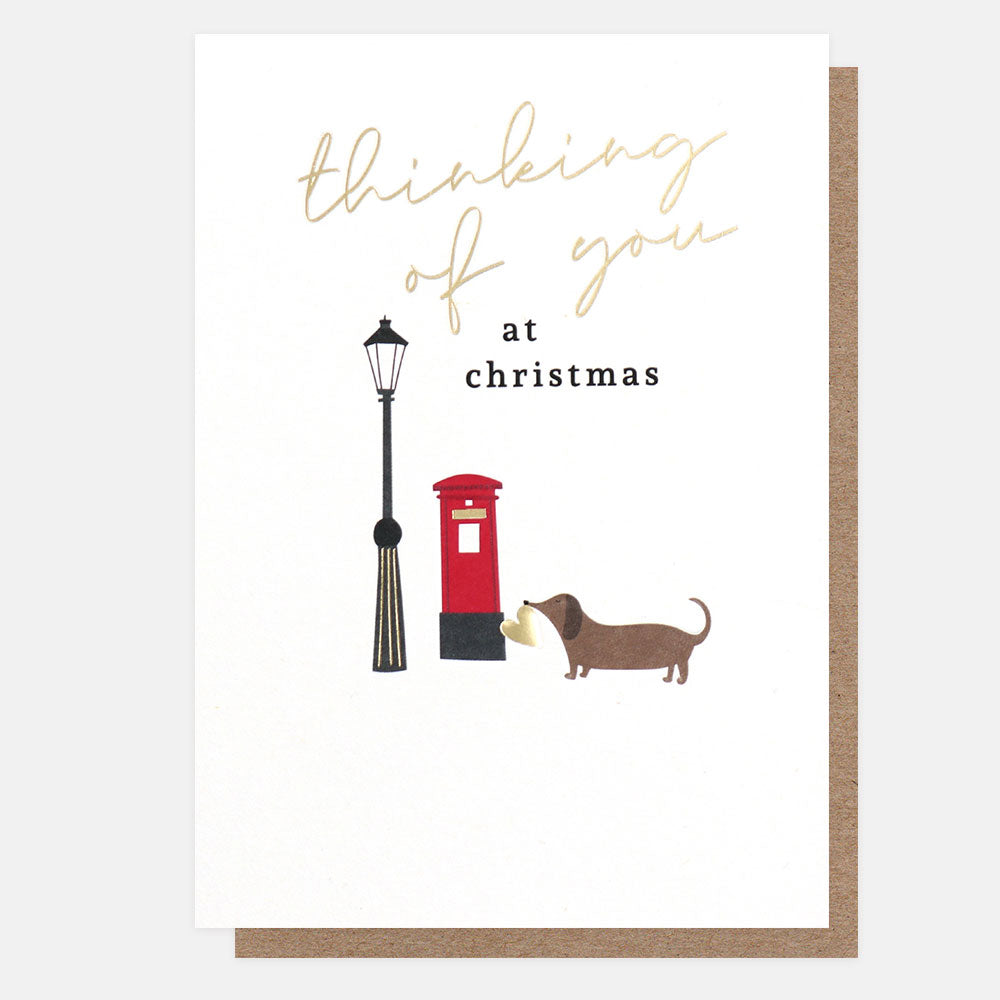 sausage dog and post box 'thinking of you at christmas' card