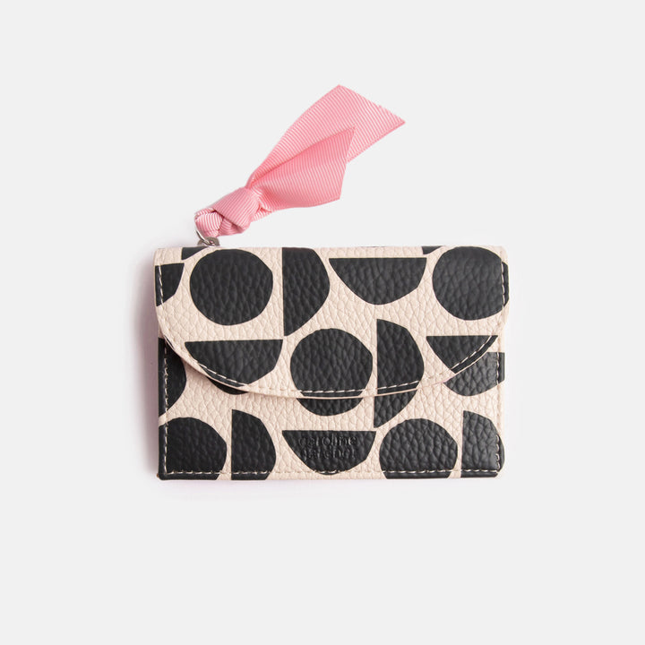 leather look PU card holder coin purse with monochrome abstract geometric shapes design, pink zip pull and pink & orange stripe lining