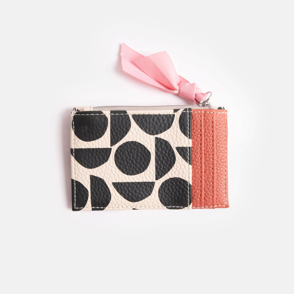 leather look PU card holder coin purse with monochrome abstract geometric shapes design, pink zip pull and pink & orange stripe lining