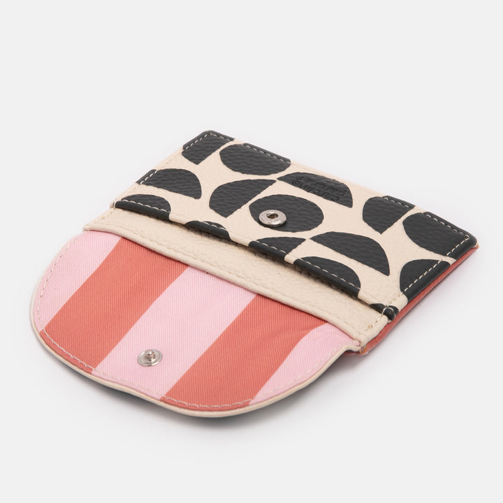 leather look PU card holder coin purse with monochrome abstract geometric shapes design, pink zip pull and pink & orange stripe lining