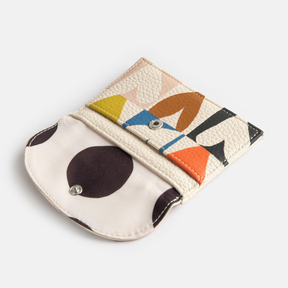 leather look PU card holder coin purse with multicolour hearts design, black zip pull and big monochrome dots lining