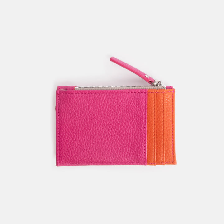 Pink and orange zippered card holder purse on a white background