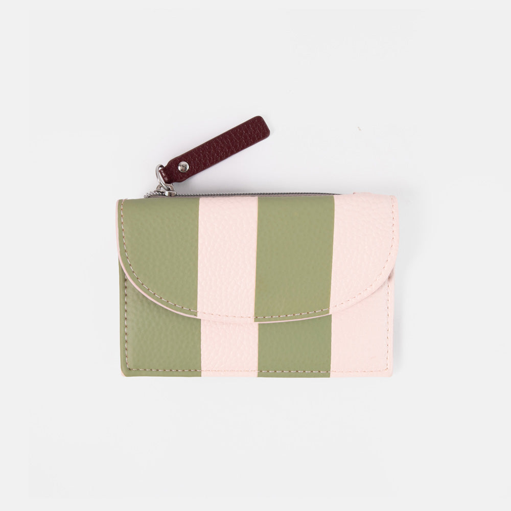 A small zippered card holder wallet with a colour-blocked design featuring olive green and light pink vertical stripes, a matching green flap, and a dark burgundy leather wrist strap with silver hardware, shown on a plain white background.