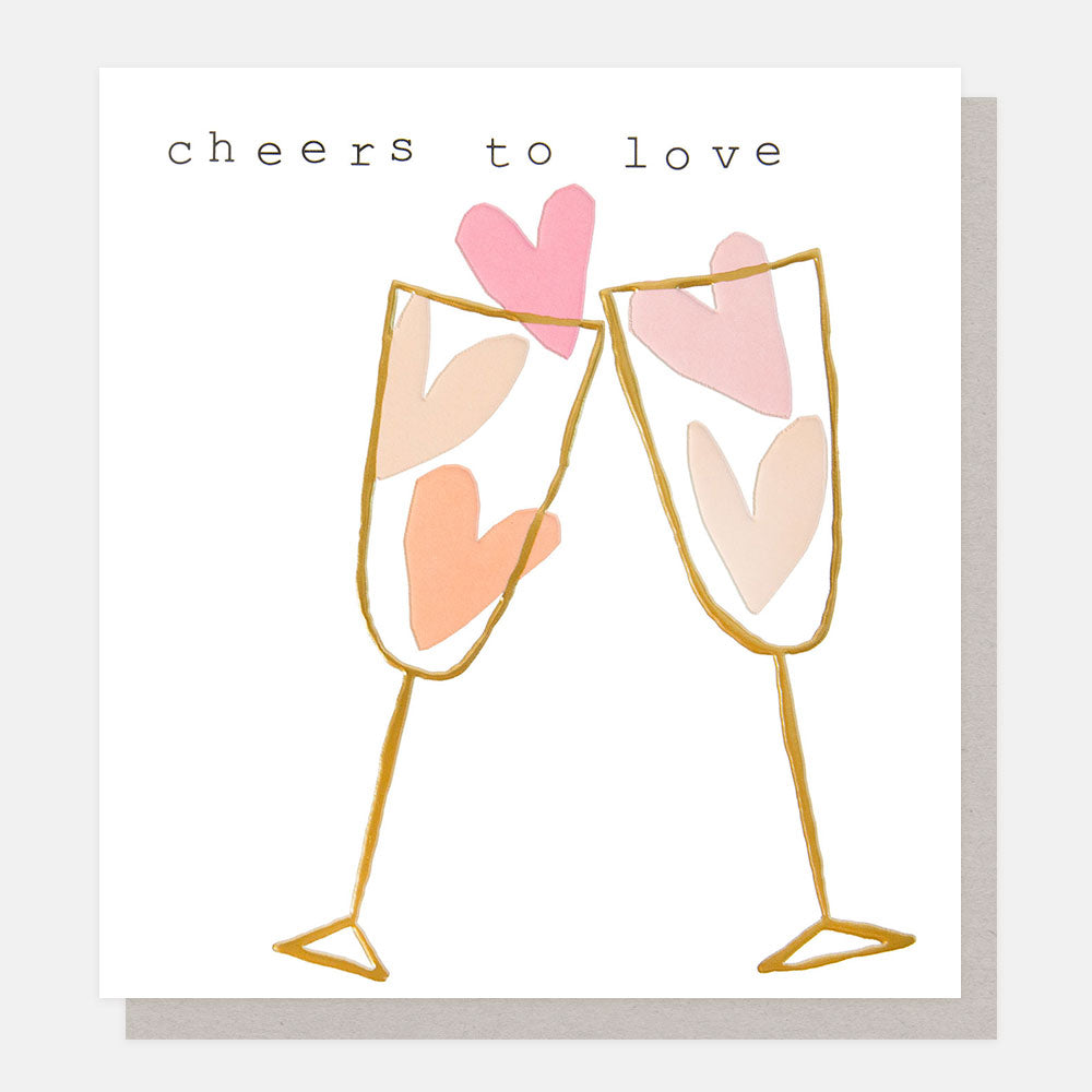 greetings card with two champagne glasses with pink hearts in and the text 'cheers to love'