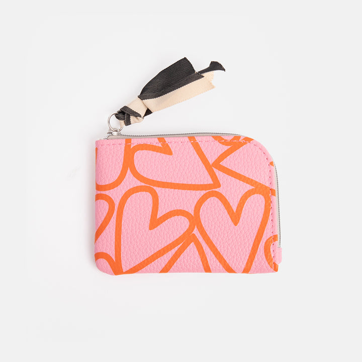 pink hearts print leather look corner purse