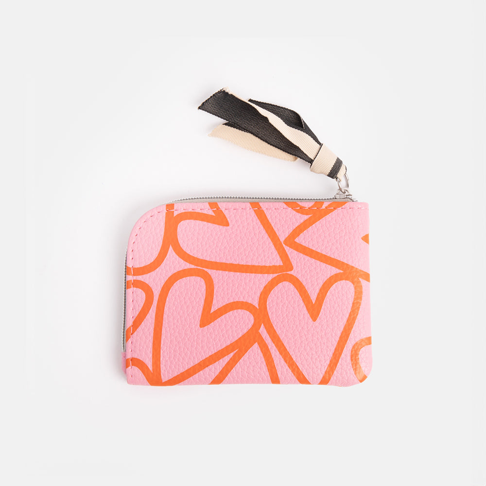 pink hearts print leather look corner purse