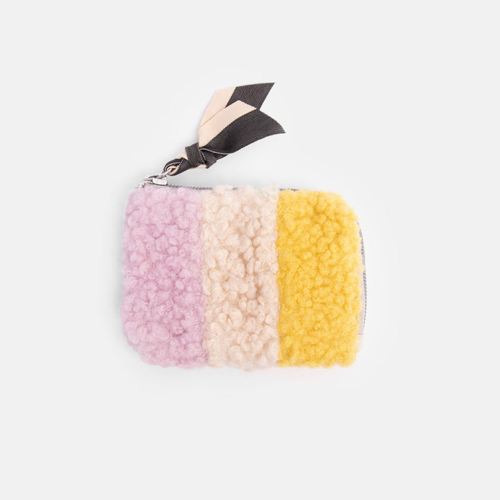 synthetic borg corner purse in cream, lilac and yellow with heart print lining, internal pockets and contrast grosgrain zip pull