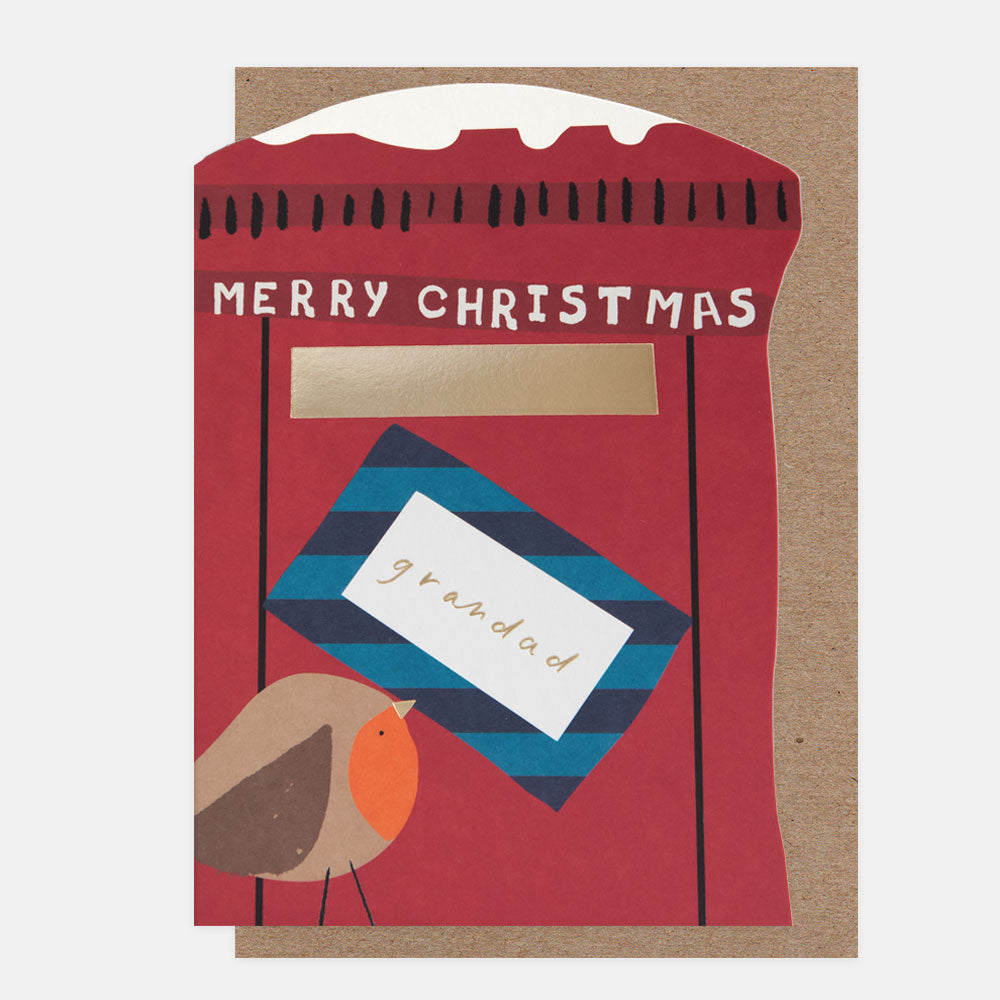 A die cut Christmas card in the shape of a post box with a robin holding a letter and the text 'merry christmas grandad'