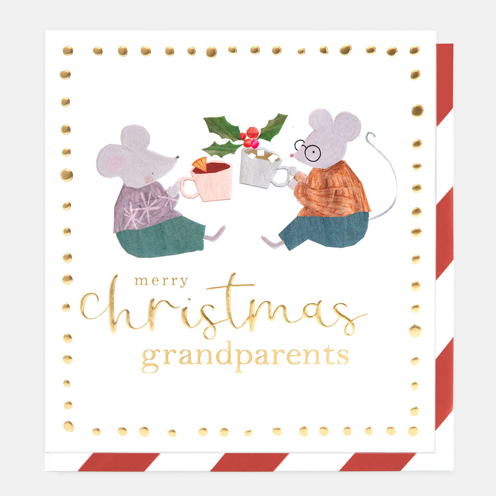 A square Christmas greeting card with a white background, featuring an illustration of two gray mice sitting with mugs and holly. The text reads 'merry christmas grandparents' in gold foil-style lettering.