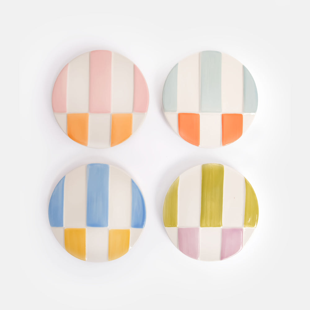 hand painted ceramic stoneware coasters with colourful raised stripe designs and anti slip silicone feet