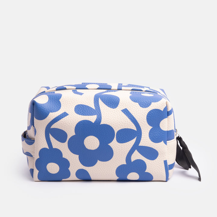 leather look PU large travel wash bag in blue floral design, with double zip opening, grab handle, heart print lining and grosgrain zip pull