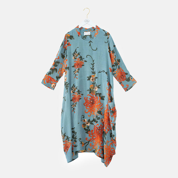 orange chrysanthemum flower print on grey base asymmetric 3/4 length dress, made by one hundred stars 