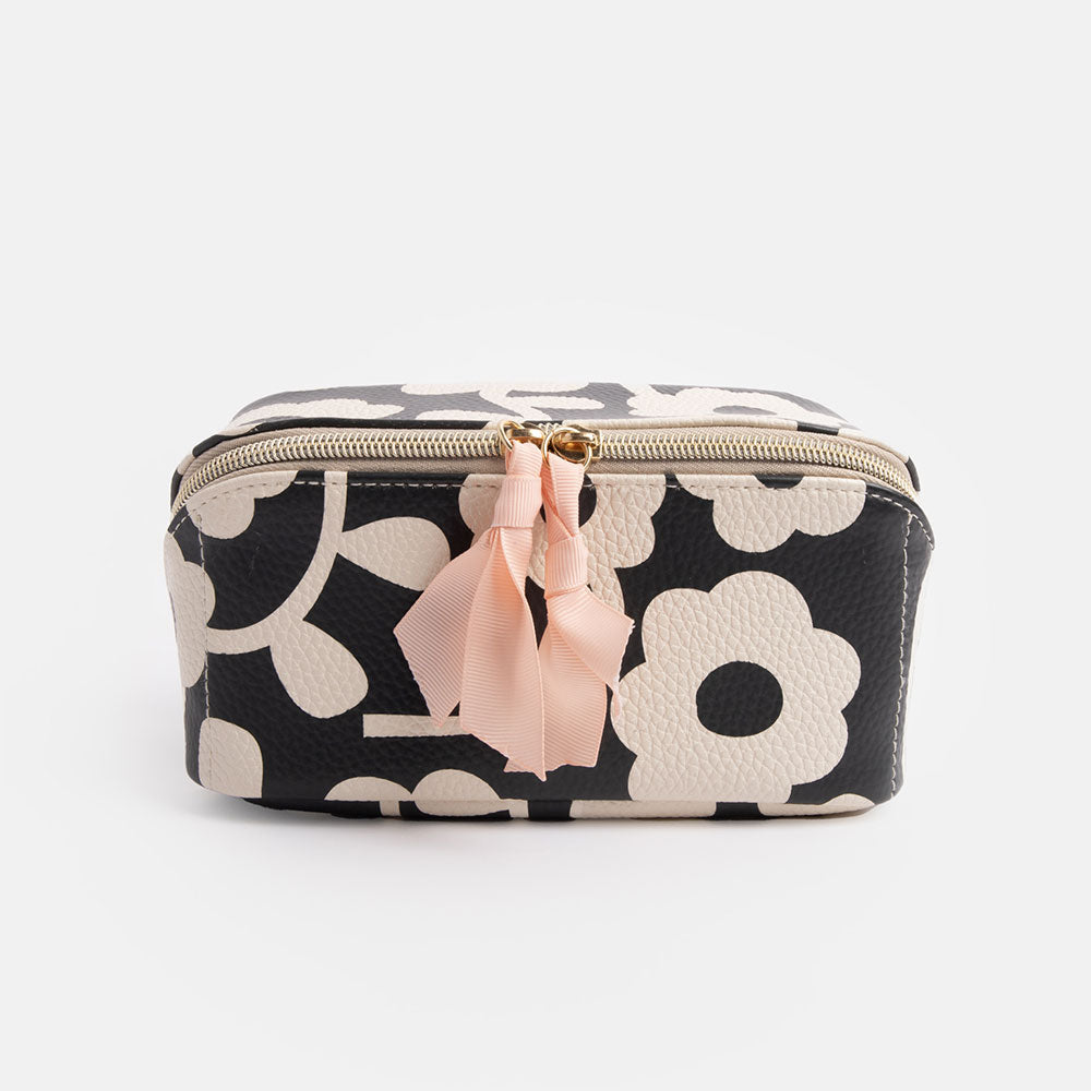 diagonal zip open flat lay cosmetics bag in monochrome flower print