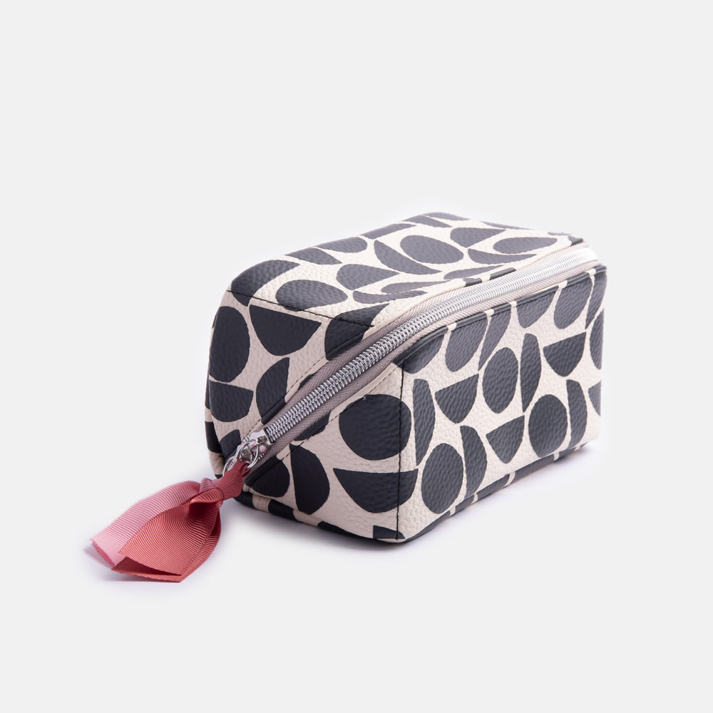 leather look PU lay flat cosmetics bag in monochrome abstract geometric shapes design with striped wipe clean lining 