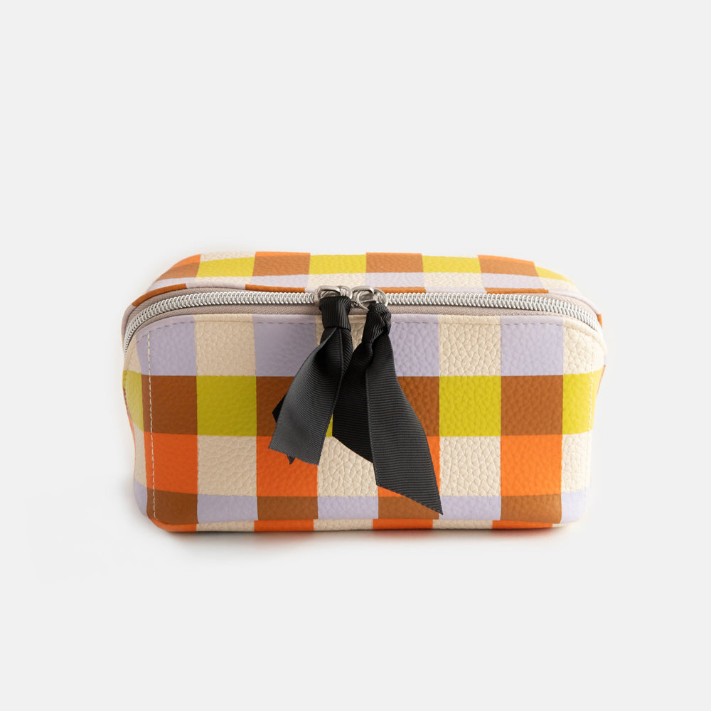 leather look PU lay flat cosmetics bag in warm tones check print with spotty wipe clean lining, silver zip and black grosgrain pull