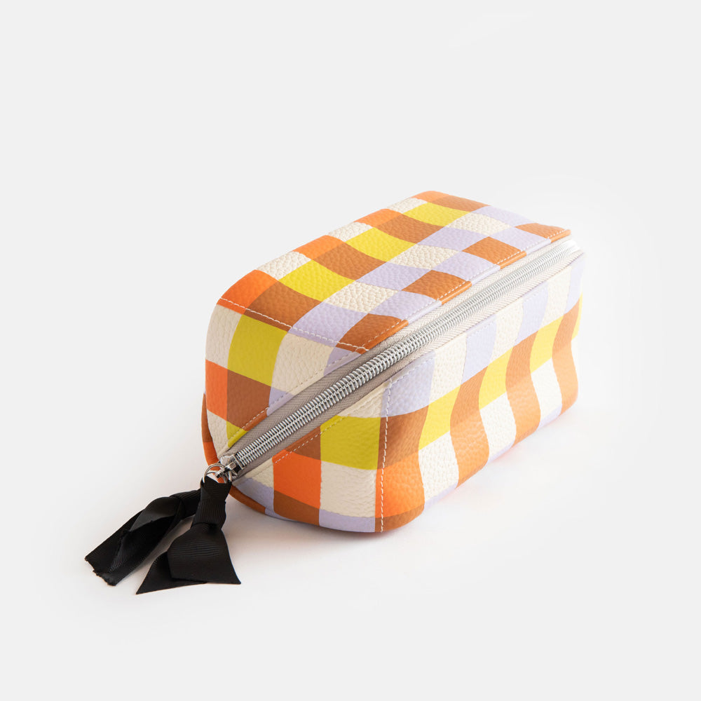 leather look PU lay flat cosmetics bag in warm tones check print with spotty wipe clean lining, silver zip and black grosgrain pull