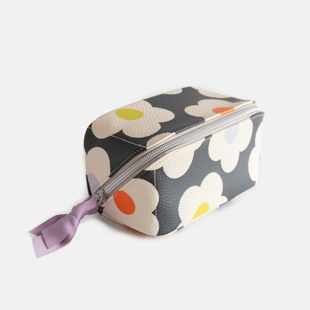 leather look PU lay flat cosmetics bag in multi flower charcoal design with striped wipe clean lining, silver zip and lilac grosgrain pull