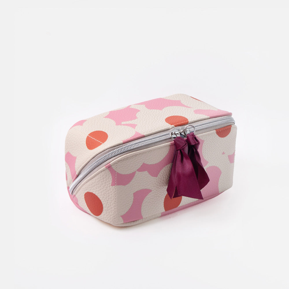 pink & white flower print flat lay wash bag