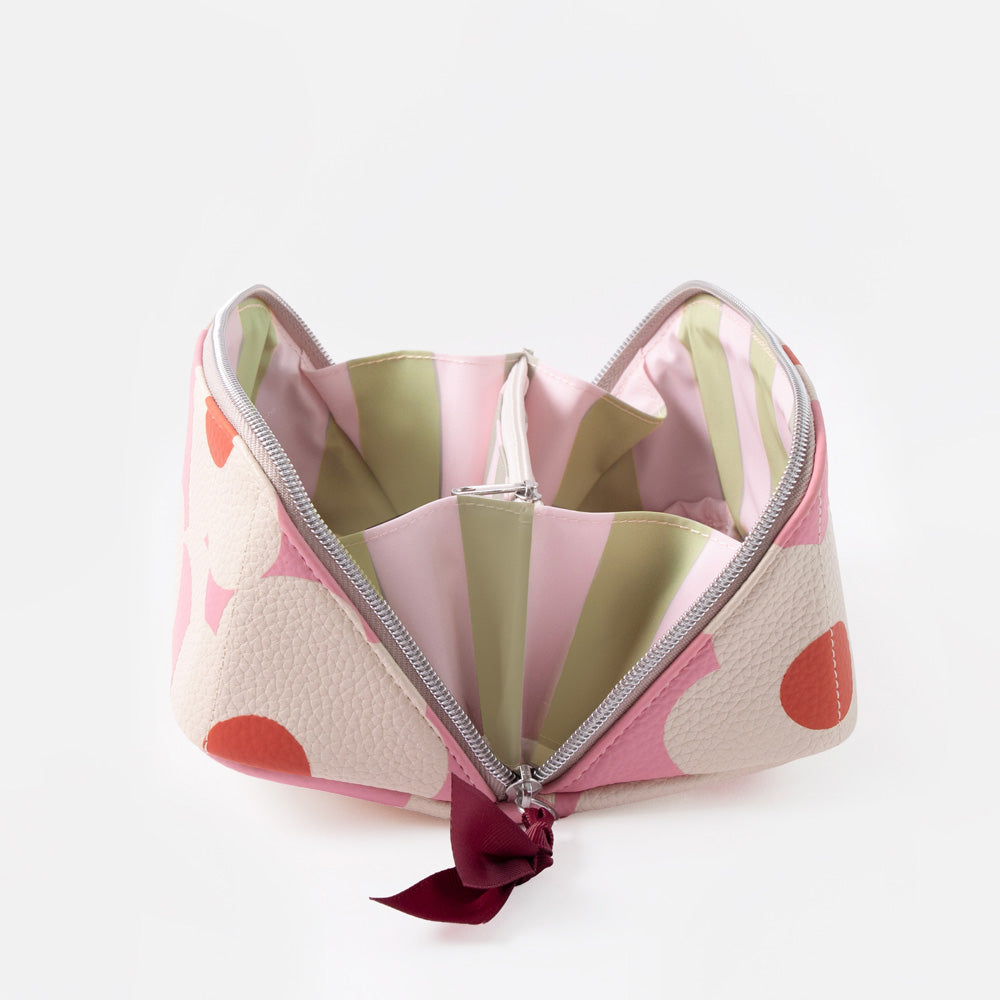 pink & white flower print flat lay wash bag open to show pink & green striped lining